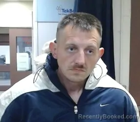 Mugshot of JUSTIN WAYNE BELCHER booked in Sedgwick County, Kansas on March 12, 2026