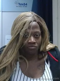 Mugshot of SHAUNTEL RENI GRAYSON booked in Sedgwick County, Kansas on March 21, 2026