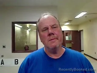 Mugshot of LESLIE WAYNE COKER booked in Sedgwick County, Kansas on March 18, 2026