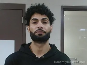 Mugshot of WAHEED ALI ABDUL AL HAJIM booked in Sedgwick County, Kansas on March 24, 2026