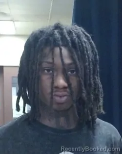 Mugshot of AKIRA CARLOS DIAZ-MILLER booked in Sedgwick County, Kansas on March 19, 2026