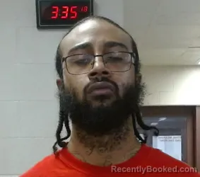 Mugshot of MARCUS WAYNE WOOD booked in Sedgwick County, Kansas on March 18, 2026