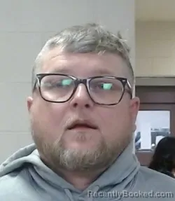 Mugshot of GROVER WILLIAM MUCKLEROY