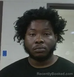 Mugshot of Marquel Davon Tarik Thomas booked in Sedgwick County, Kansas on September 29, 2026