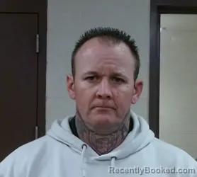 Mugshot of KYLE ALAN TOMKINS booked in Sedgwick County, Kansas on March 12, 2026