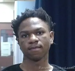 Mugshot of JOHNTEL E BROWN booked in Sedgwick County, Kansas on March 18, 2026