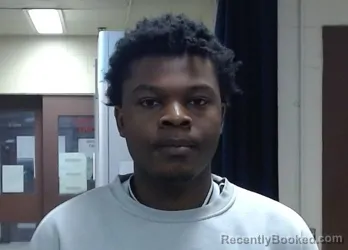 Mugshot of MAURICE SAMUEL NSEKUYE booked in Sedgwick County, Kansas on March 18, 2026