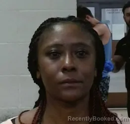 Mugshot of EUNICE WANJIRU KURANJA booked in Sedgwick County, Kansas on March 18, 2026