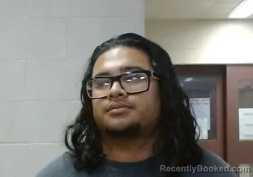 Mugshot of ANTHONY UJEK INOK-JACOB booked in Sedgwick County, Kansas on March 18, 2026