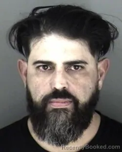 Mugshot of Eric Michael Madrid