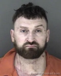 Mugshot of Jonathan David Scott Minton booked in Shawnee County, Kansas on March 12, 2026