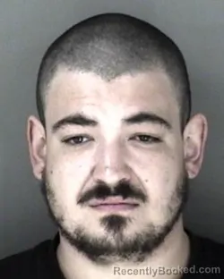 Mugshot of Alexander Charles Reed booked in Shawnee County, Kansas on March 30, 2026