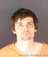 Mugshot of LOGAN CHARLES CARROLL-JARAMILLO