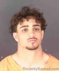 Mugshot of MADIYAN TAREQ ABUMUNSHAR