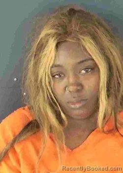 Mugshot of AQUARIUSSPREE HOLMES booked in Sarasota County, Florida on March 13, 2026