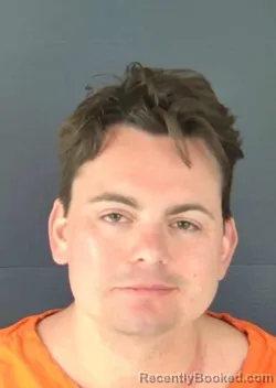 Mugshot of JUSTIN MICHAEL SCOBEY booked in Sarasota County, Florida on March 23, 2026