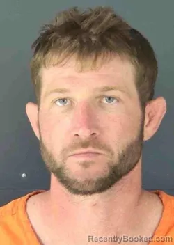 Mugshot of JOHN ANDREW KENTER booked in Sarasota County, Florida on April 1, 2026