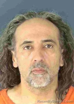 Mugshot of ROLANDO MARTIN COLIGUANTE booked in Sarasota County, Florida on May 20, 2026