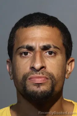 Mugshot of SANTOS JONATHAN RIVERA