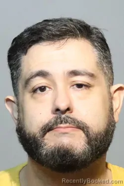 Mugshot of ALBERTO R TAVAREZ