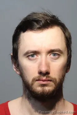 Mugshot of JUSTIN MITCHELL VANCOTT HARNISH