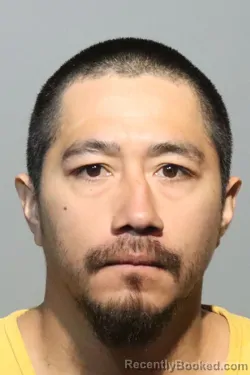 Mugshot of JONATHAN AREVALO-MILIAN