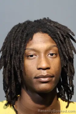 Mugshot of DAYVONE DOZELLEAHMAD GRAHAM-IBRAHEEM