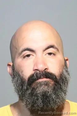 Mugshot of Omilie Lopez Cotto booked in Seminole County, Florida on August 10, 2026
