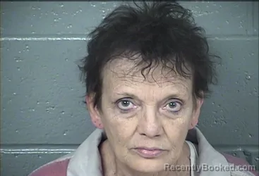 Mugshot of JACQUELINE MARIE LEACH booked in Wyandotte County, Kansas on March 6, 2026