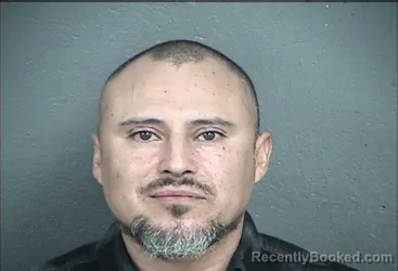 Mugshot of JESUS ABRAHAM GODINEZ-HERNANDEZ booked in Wyandotte County, Kansas on March 28, 2026