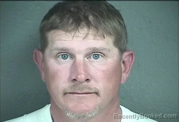 Mugshot of TODD MICHAEL COATES booked in Wyandotte County, Kansas on March 29, 2026