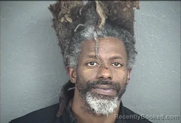 Mugshot of COLEMAN DENARD RUSS booked in Wyandotte County, Kansas on April 1, 2026