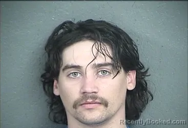 Mugshot of DOMINIK JAYCE NOVOTNEY booked in Wyandotte County, Kansas on April 26, 2026