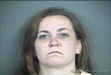 Mugshot of SARAH ELIZABETH CORRAL-LOPEZ booked in Wyandotte County, Kansas on May 13, 2026
