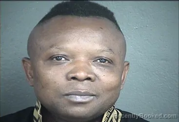 Mugshot of FILIPO MUHIGIRWA booked in Wyandotte County, Kansas on May 14, 2026