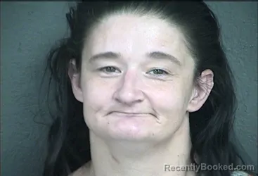 Mugshot of TINA LOUISE ADAMS booked in Wyandotte County, Kansas on May 21, 2026