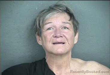 Mugshot of LEANN LOUISE OPAT booked in Wyandotte County, Kansas on May 31, 2026