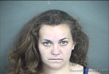 Mugshot of SARAH ELIZABETH CORRAL-LOPEZ booked in Wyandotte County, Kansas on June 17, 2026