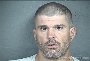 Mugshot of RYAN HUNTER ADAMS booked in Wyandotte County, Kansas on July 2, 2026