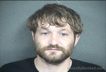 Mugshot of John David Howard booked in Wyandotte County, Kansas on August 10, 2026