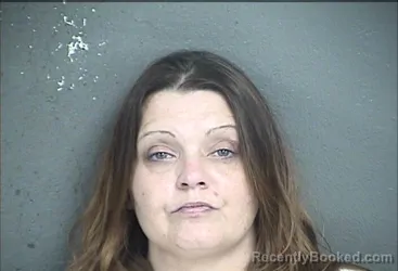 Mugshot of Jennifer Louise Lesher booked in Wyandotte County, Kansas on August 18, 2026