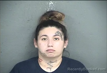 Mugshot of Courtney Nicole Florez booked in Wyandotte County, Kansas on October 13, 2026