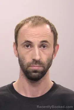 Mugshot of Taylor Gene Saum