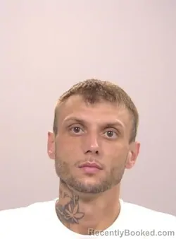 Mugshot of Cody Miller