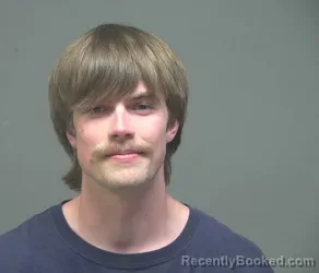 Mugshot of NIKOLAS MICHAEL CHRISTIAN CAMERON booked in Athens County, Ohio on April 12, 2026