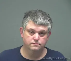 Mugshot of CHRISTOPHER ADAM MCDANIEL booked in Athens County, Ohio on April 14, 2026