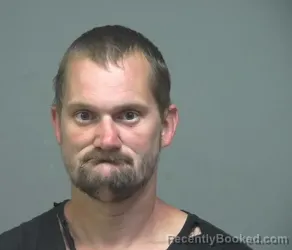 Mugshot of Eric James Feathers booked in Athens County, Ohio on August 25, 2026