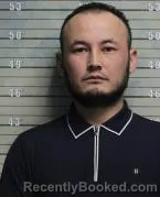 Mugshot of KOSIMBOY BERDIKULOV