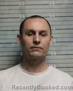 Mugshot of ILGOR BARDTOVICH AKHMEDOV