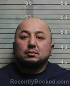 Mugshot of ABROR IZZATILLAEVICH AKRAMOV